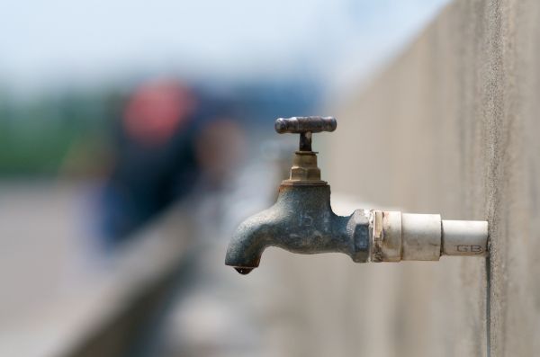 Outdoor Faucet Plumbing in Orange